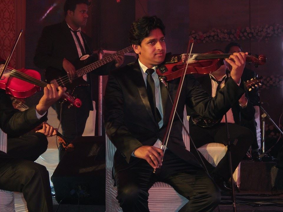male violin player lakshadweep